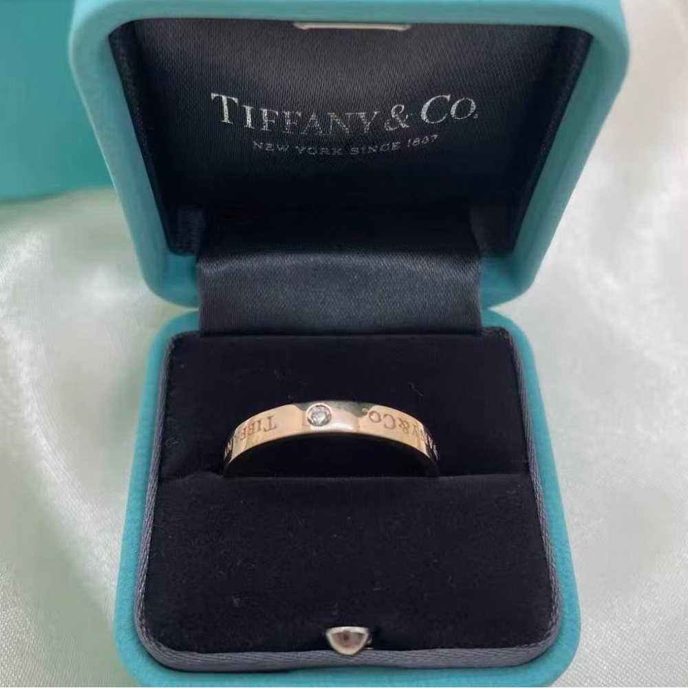 Tiffany & Co. Gold Ring with Diamond Accent